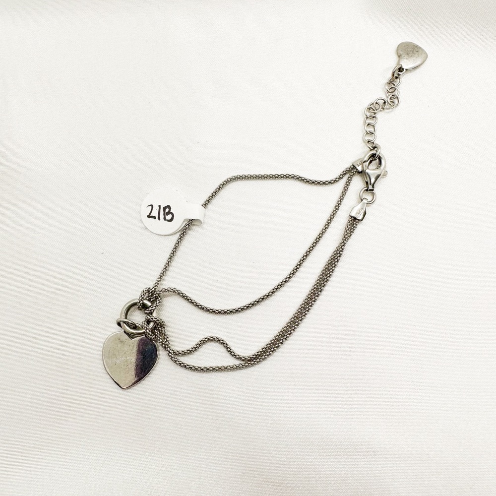 Elegant Silver Heart Pendant Bracelet